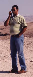 Sabri, our bus driver, phoning to get his bus fixed